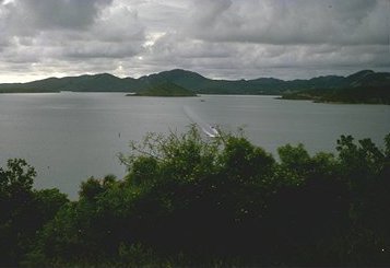 The catalina flying boat landing on Port Moresby 
Harbour on a very overcast day.