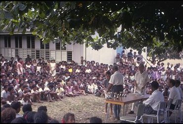 An outdoor assembly at Hagara Primary School, 
no refinements such as a school hall there.